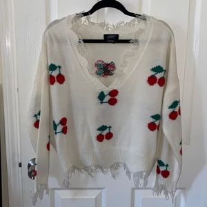 NWOT oversized distressed cherry knit top